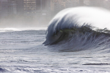 perfect wave at copacabana beach in rio de janeiro.