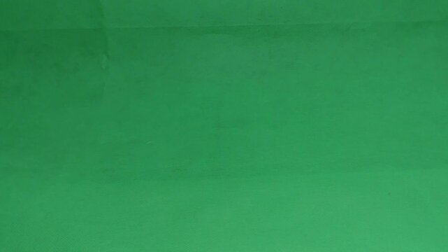 footage of an international standard badminton shuttlecock made from goose feathers, isolated on green screen. Perfect for sports videos, design projects, visual effects, and badminton-related content