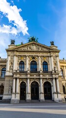 Obraz premium Ornate stone building facade, sunny day