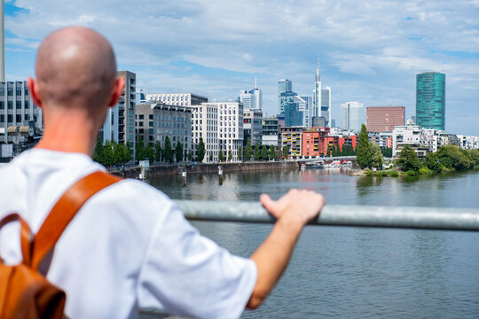 traveler enjoying city view, Main river, Journey and destination, new adventure in metropolitan area, urban exploration, and European destinations, Travel and tourism, Frankfurt - August 11, 2025