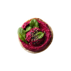 Fototapeta premium Beetroot Hummus on Pita Bread with Spinach and Sesame Seeds - Overhead Shot