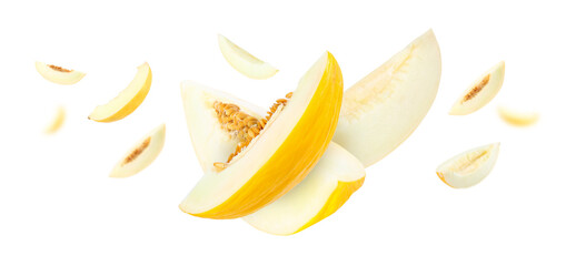 Cut fresh ripe melons swirling in air against white background