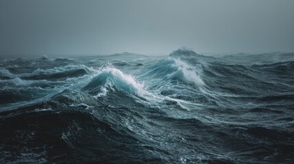 Fototapeta premium Stormy sea with turbulent waves and moody skies at twilight