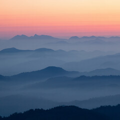 Fototapeta premium Serene Misty Mountains at Sunrise, tranquil landscape photography