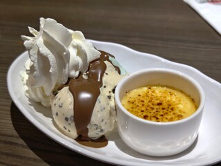 Indulge in this delicious ice cream sundae with chocolate sauce