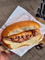 Delicious north sea shrimp sandwich with sauce on a napkin ready to be eaten