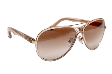 Stylish rose gold aviator sunglasses with gradient brown lenses isolated on a black background