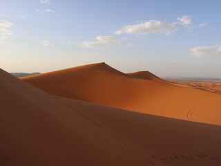 Golden Sand Dunes of the Sahara Desert in Merzouga, Morocco