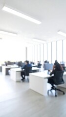 Blurred office interior.  People working