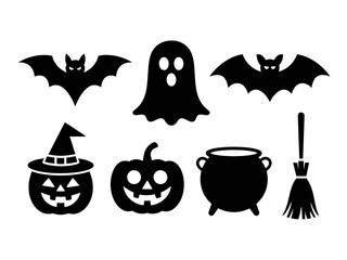 Obraz premium Collection of halloween icons including bats ghost pumpkins cauldron and broomstick silhouette isolated on white background