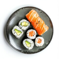 Top-down view of sushi assortment on dark gray plate