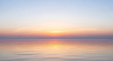 Fototapeta premium Serene Ocean Sunrise Reflecting Golden Hues