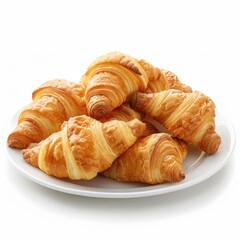 A plate piled high with golden-brown croissants
