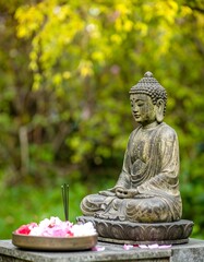 Buddha statue in garden setting (1)