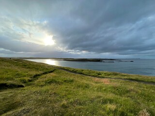 Sunset Over Coastal Landscape in Iceland