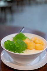 Sago cantaloupe with coconut milk, Thai dessert served in a bowl