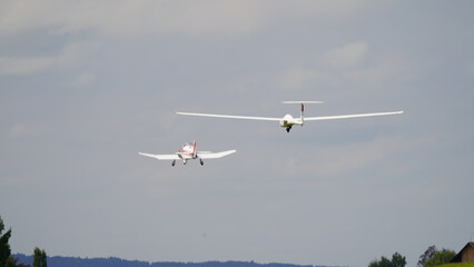 Tow Plane Launching a Glider over Countryside
