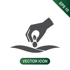 Hand planting seed icon