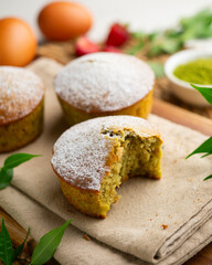 Japanese matcha tea cake decorated with strawberries. Traditional Japanese sweet cake recipe.