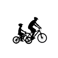 Silhouette of Father and Child Riding Bikes at Night