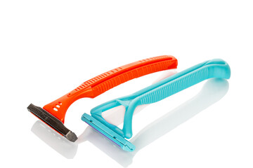 Disposable razor isolated on white background, close-up.