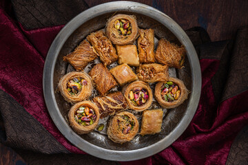 Traditional turkish, arabic sweets baklava assortment with pistachio