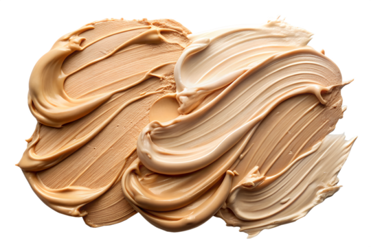 Swirls of creamy foundation swatches isolated on white background