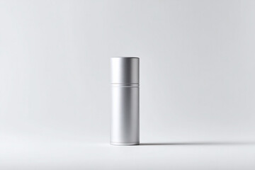 Sleek silver container on white. Minimalist design for cosmetics, aromatherapy, or healthcare products. Ideal for beauty, wellness, and personal care marketing.