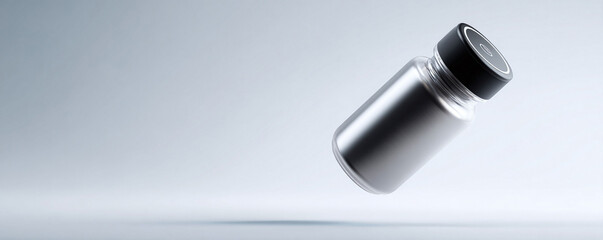Sleek, minimalist image of a vial with a black cap, floating on a light background. Ideal for pharmaceutical, science, or technology concepts. Clean, modern aesthetic.