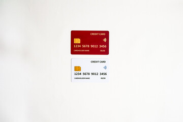 Obraz premium Isolated Image of Two Credit Cards on a White Background Suggesting Financial Transactions
