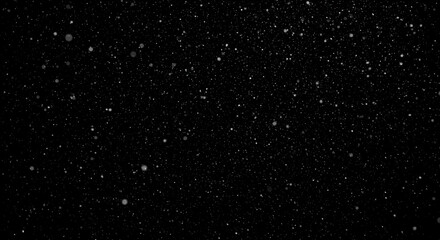 Obraz premium An abstract depiction showcases a dark canvas, speckled with subtle, luminous particles, creating a mysterious and intriguing visual experience, evoking a sense of depth.