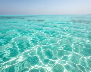 Crystal Clear Turquoise Ocean Water with Sunlight Reflections on a Sunny Day