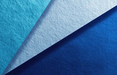 Abstract layered shapes of textured blue and white papers, forming a diagonal pattern