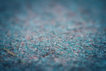 Obraz premium Extreme closeup of turquoise handmade paper with shallow depth of field.
