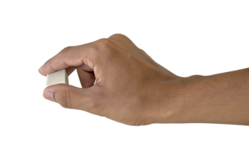 Male hand holding small beige eraser isolated on a transparent background image