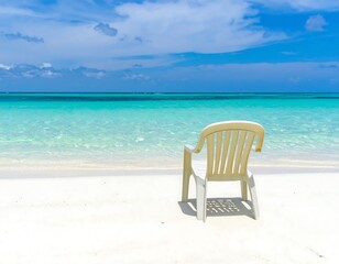 Fototapeta premium Beach chair on pristine white sand