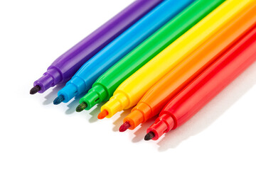 Markers of rainbow colors isolated on white background