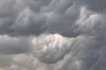 Dark storm clouds are moving towards the city
