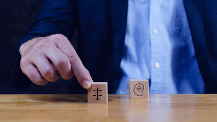 AI ethics or AI law concept. balancing artificial intelligence with humanity, Icons related AI ethics on wooden cube, symbols of legal scales, security