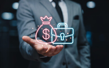 Business finance and investment portfolio concept with businessman holding glowing money bag and briefcase icons.