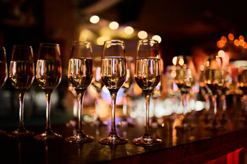 Elegant Wine Glasses with Wine on a Table	
