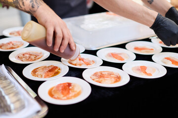 Chef Preparing Salmon Carpaccio Plates