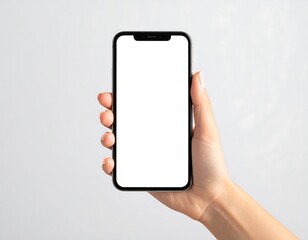 Hand Holding Smartphone with Blank Screen Against Gray Background.