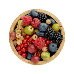 different berries in a wooden plate on a white background, top view