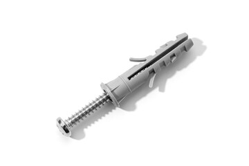 Plastic dowel and screw isolated on a white background. Expansion anchors or fixing dowel with chromed screw