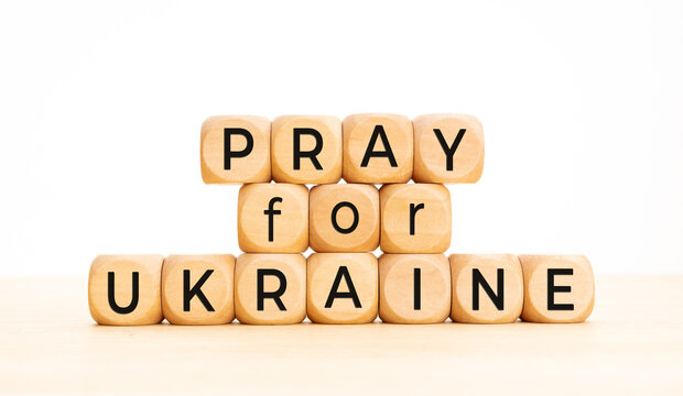 Pray for Ukraine message on wooden blocks