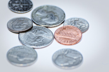 Closeup Scattered US Currency Coins Saving Commerce Focus