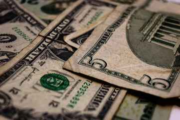 Close-Up Overlapping Five Dollar Bills Showing Detailed Currency Design Security Features Money Finance