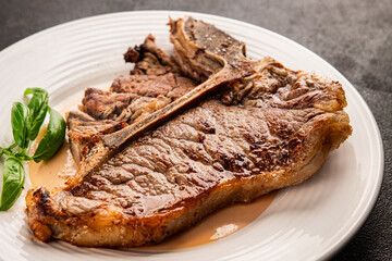 t-bone steak roast cut of meat juicy roast beef tasty snack fresh delicious gourmet food background on the table rustic food top view copy space