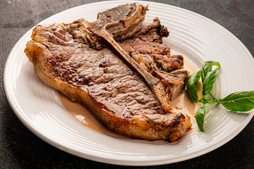 t-bone steak roast cut of meat juicy roast beef tasty snack fresh delicious gourmet food background on the table rustic food top view copy space